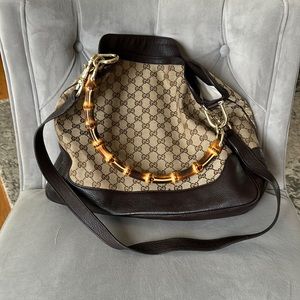 Gucci shoulder bag.  Brown leather trim.  Bamboo shoulder